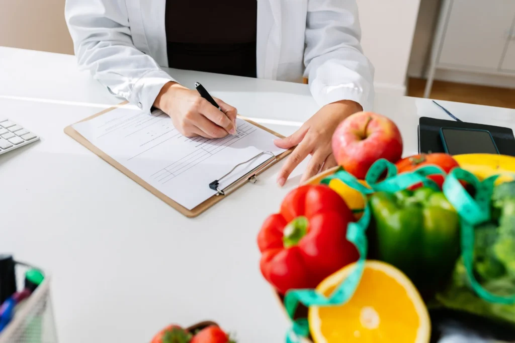 closeup view of female nutritionist hands working 2026 03 24 06 24 13 utc 1
