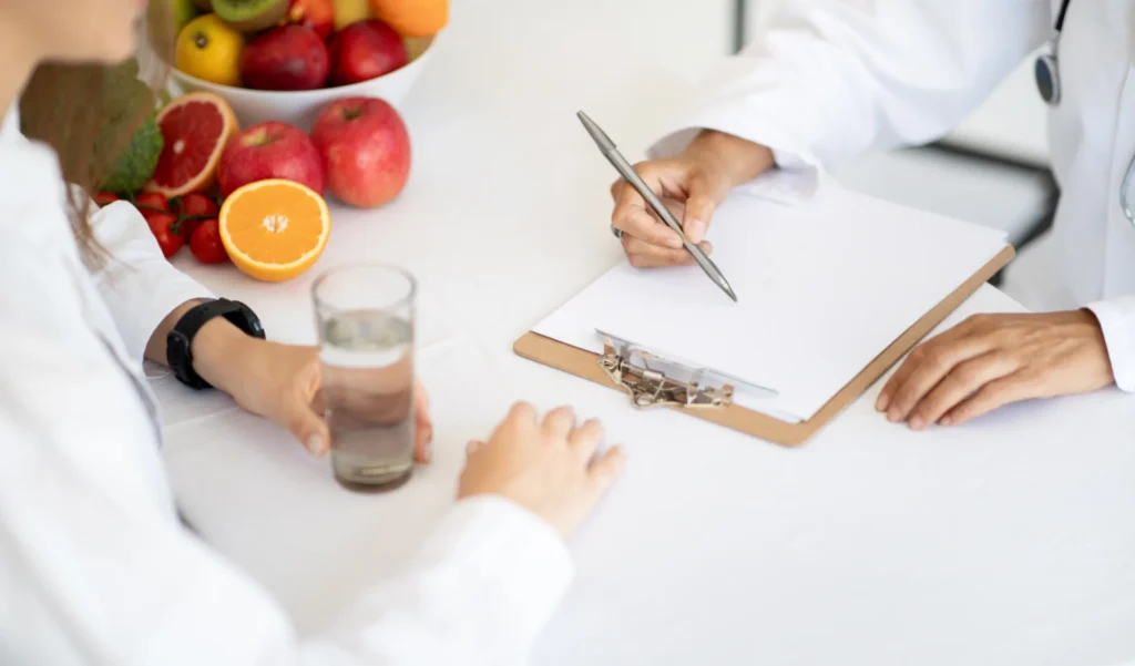 doctor consults patient about healthy diet plan 2026 03 24 01 57 15 utc